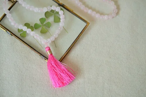 Mala en quartz rose.